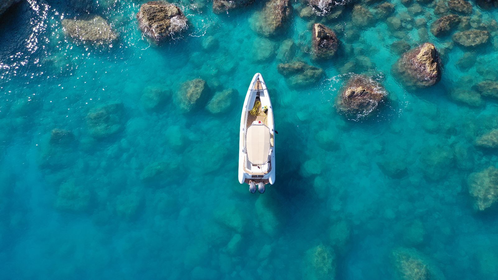 Dinghy in crystal clear sea